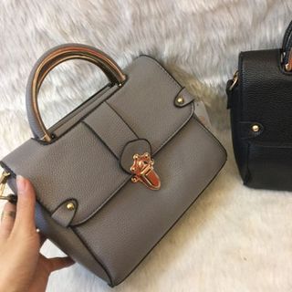 Túi xách quai sắt khoá sập