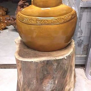 di lặc cầm bát vàng gỗ bơ mu