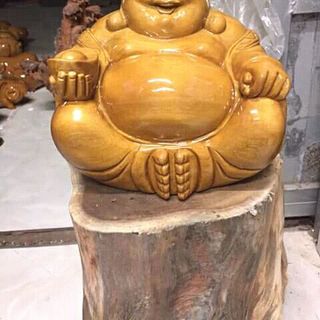 di lặc cầm bát vàng gỗ bơ mu