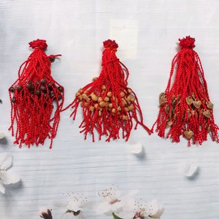 vòng tay chỉ đỏ mai mắn