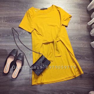 đầm vàng cột eo