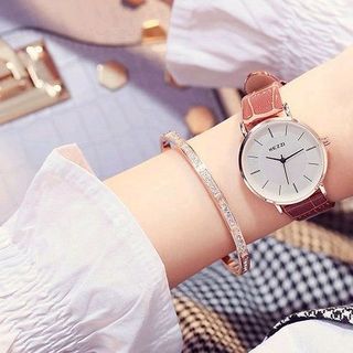 đồng hồ cặp nam nữ kezzi