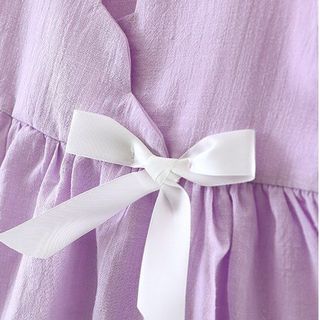váy cổ chéo đính nơ