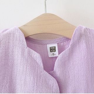 váy cổ chéo đính nơ