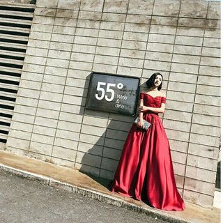 ĐẦM MAXI ĐÍNH HOA TRỄ VAI 3D