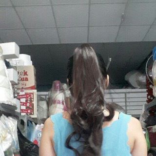 Tóc giả cột xoăn