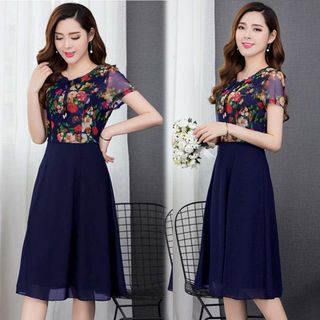 Đầm xòe chiffon xanh in hoa 3D phối ren cột nơ