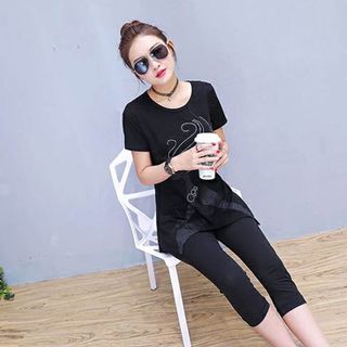 Set bộ lửng đen form dài cô gái
