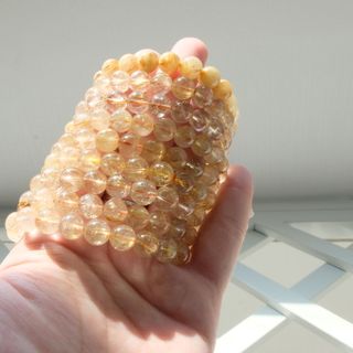 Vòng tay thạch anh tóc vàng 10ly