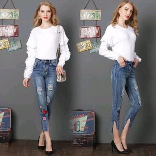 QUẦN JEANS THÊU HOA HỒNG XẺ BÊN giá sỉ