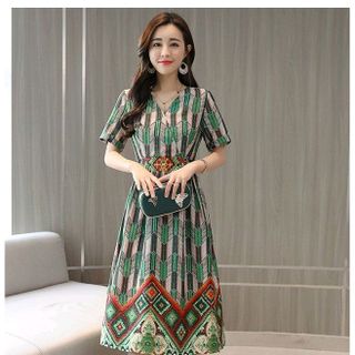 ĐẦM XÒE CỔ V IN HỌA TIẾT HOA VĂN CỘT NƠ SAU