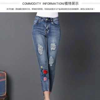 QUẦN JEANS THÊU HOA HỒNG XẺ BÊN