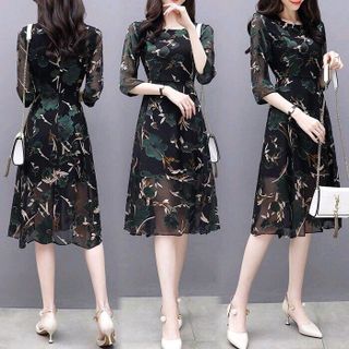 ĐẦM XOÈ HOA XANH TAY LỠ