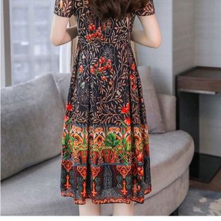 ĐẦM XÒE VOAN HỌA TIẾT HOA KIỂU ĐƠN GIẢN