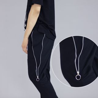 Quần thun đen phối zip
