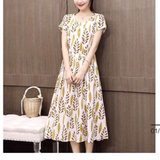 ĐẦM VINTAGE HOẠ TIẾT LÁ VÀNG