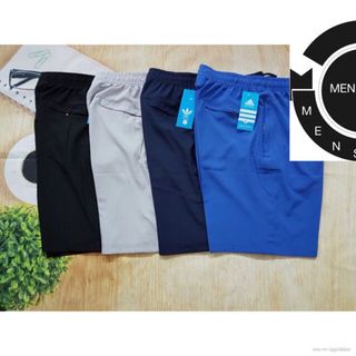 quần gió thể thao nam đục laze