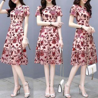 ĐẦM VOAN TAY CON HỌA TIẾT