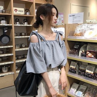 ÁO TRỄ VAI NƠ
