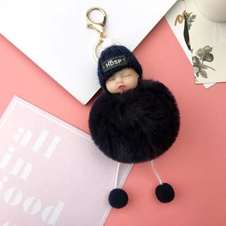 Móc khoá em bé đội nón