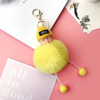 Móc khoá em bé đội nón