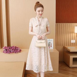 Đầm ren xòe màu da hở vai phối dây phụ kiện