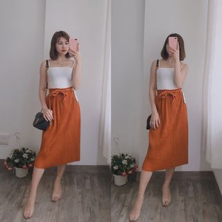 CHÂN VÁY DẬP LI CỘT NƠ