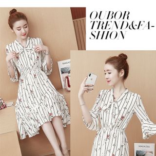 ĐẦM XÒE ĐUÔI CÁ TAY LOE CỘT NƠ IN SỌC HOA D1170