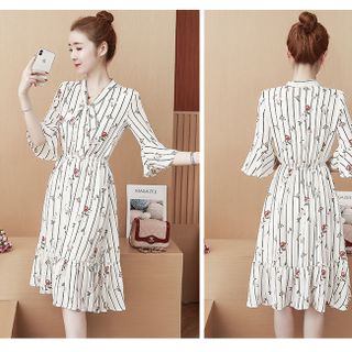 ĐẦM XÒE ĐUÔI CÁ TAY LOE CỘT NƠ IN SỌC HOA D1170