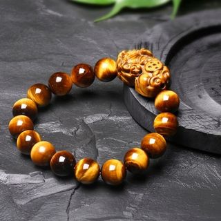 chuỗi đeo tay đá mắt hổ mặt tỳ hưu kích thước mỗi hạt 12mmgiá sỉ 99k 1 chuỗi z a l o 0 9 8 72 1 79 5 2