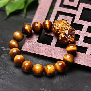 chuỗi đeo tay đá mắt hổ mặt tỳ hưu kích thước mỗi hạt 12mmgiá sỉ 99k 1 chuỗi z a l o 0 9 8 72 1 79 5 2