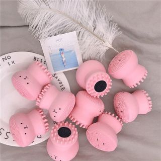 Cọ rửa mặt và massage bạch tuộc