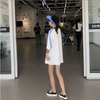 áo thun tay lỡ giấu quần
