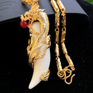 Dây chuyền trúc nanh bọc rồng mạ vàng