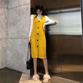 đầm nút cổ tim