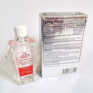 Dầu Con Ó Trắng 1 Nắp