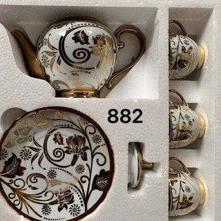 Bộ ấm sứ tách trà họa tiết cây lá
