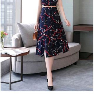 ĐẦM XOÈ HOẠ TIẾT KÈM NỊT