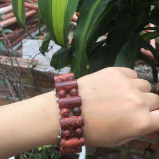 lách tay gỗ sưa