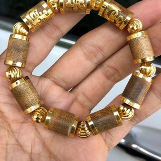 vòng trầm hàng tốc bọc vàng 18k