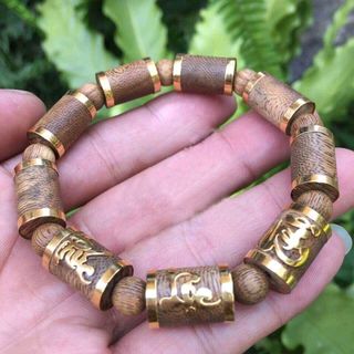 vòng trầm hàng tốc bọc vàng 18k