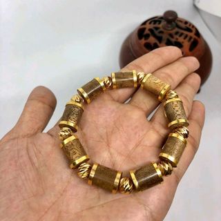 vòng trầm hàng tốc bọc vàng 18k