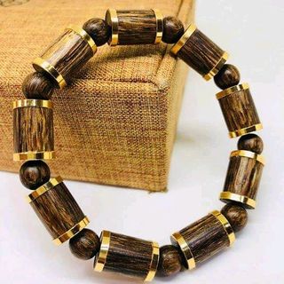 vòng trầm hương sánh chìm bọc vàng 18k