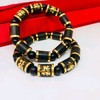 vòng trầm hương indo bọc vàng 18k