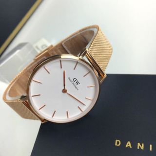 Đồng hồ D W Nữ dây kim loại gá bán buôn