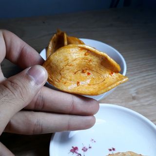 Tai Heo Bơ Tỏi