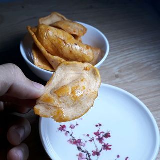 Tai Heo Bơ Tỏi