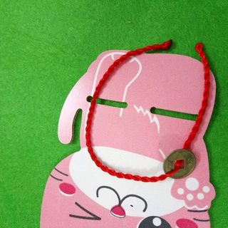 dây đỏ đeo tay kèm mặt 1