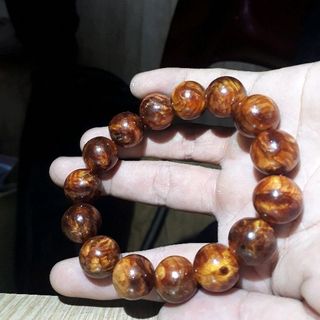 Vòng gỗ HUYẾT NGỌC 14li 15 hạt