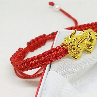 Vòng tay Tỳ hưu dây đỏ may mắn bán sỉ Đan dẹt